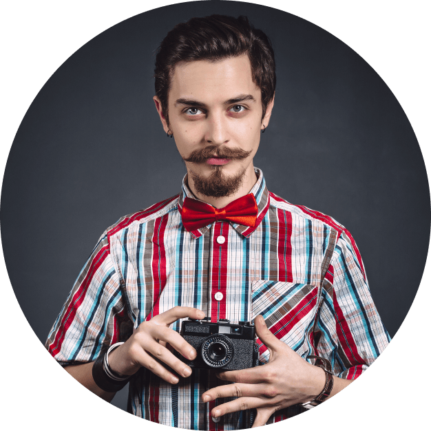 Photographer holding camera